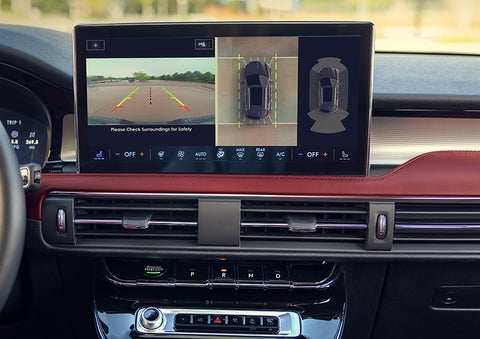 The driver of a 2024 Lincoln Corsair® SUV is shown selecting the drive mode. | Mark Ficken Lincoln in Charlotte NC