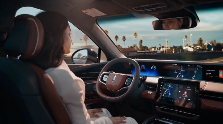 A person is shown driving hands-free on the highway with available Lincoln BlueCruise technology. | Mark Ficken Lincoln in Charlotte NC